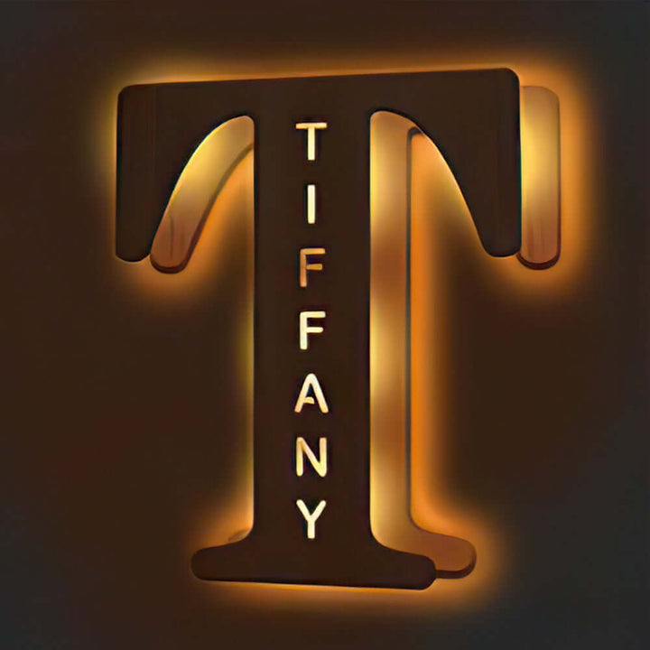 Enchanted Woodland Alphabet Lamp - Illuminated wooden letter T for "Tiffany" adding a warm glow and charm to any room.