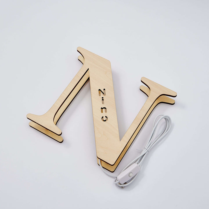 Wooden letter 'N' Enchanted Woodland Alphabet Lamp with integrated lighting and power cord, perfect for personalized nursery or bedroom decor