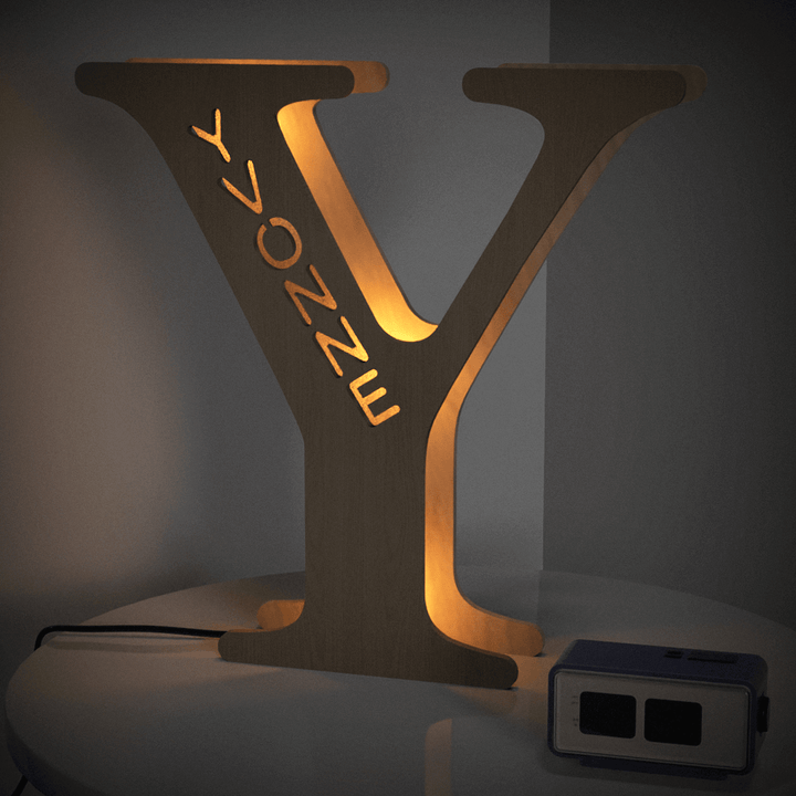 Enchanted Woodland Alphabet Lamp in Y shape, illuminated, customizable wooden letter night light for nurseries and bedrooms.